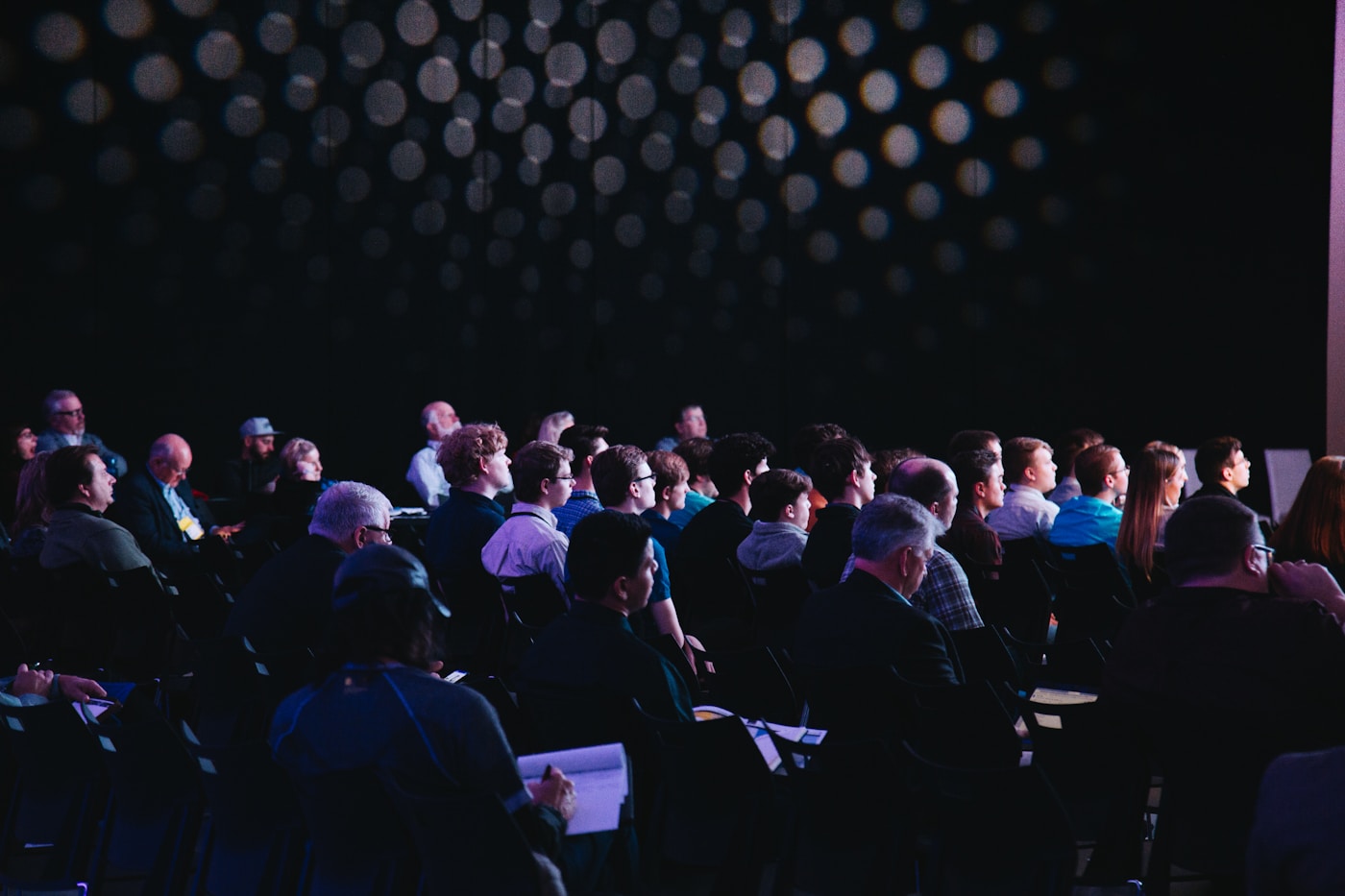 Small team participating in AI workflow workshop around a round table